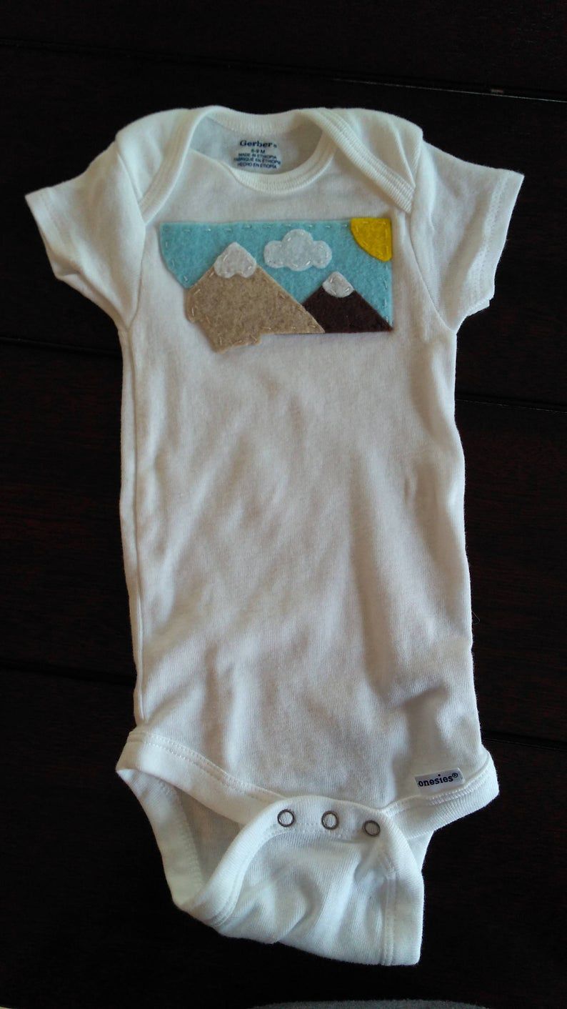 Montana felt applique onesie
